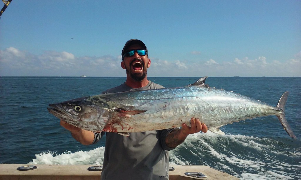 Huge kingfish caught trolling on the reef.