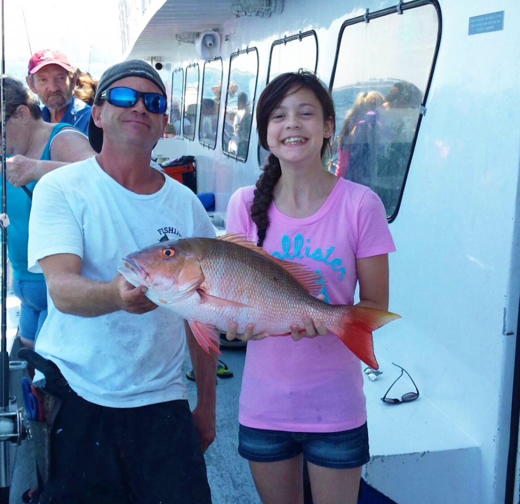 Nice snapper caught by young lady angler