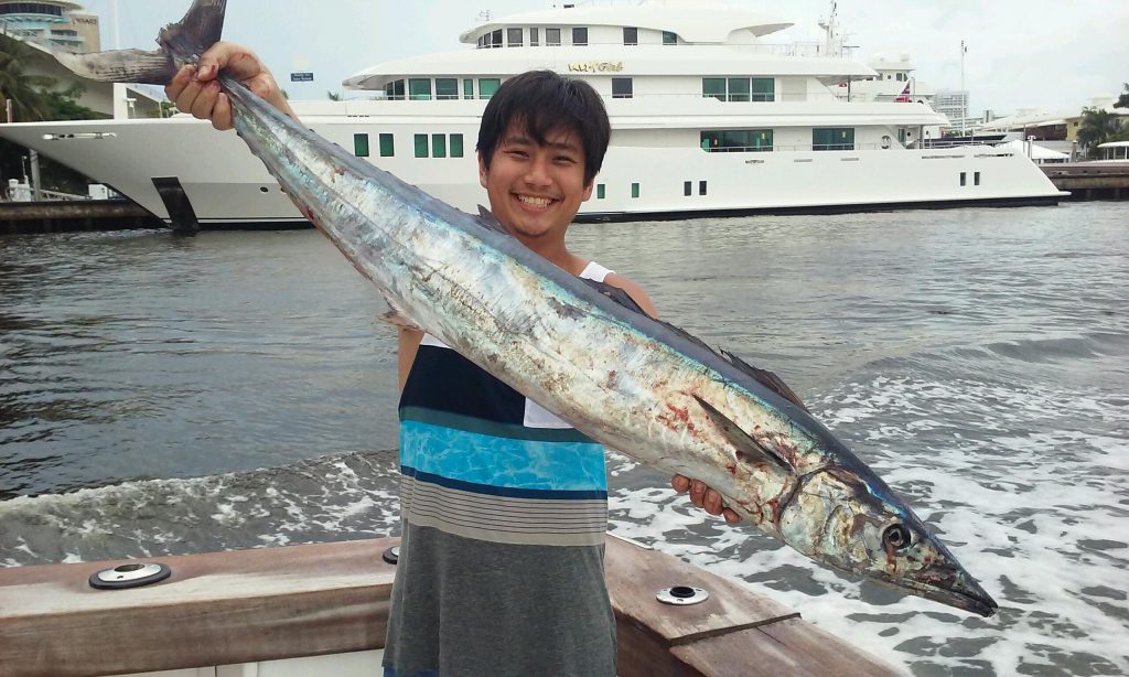 Guy holding a nice wahoo