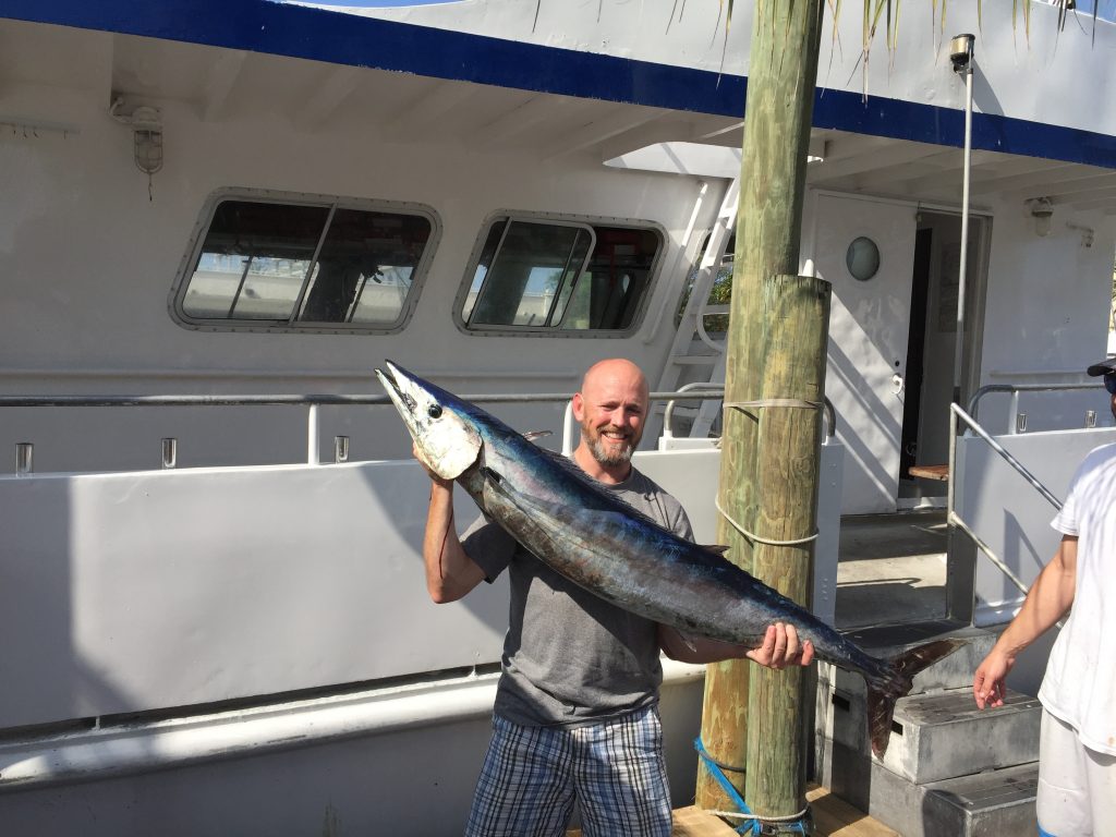 Nice wahoo with a happy angler.