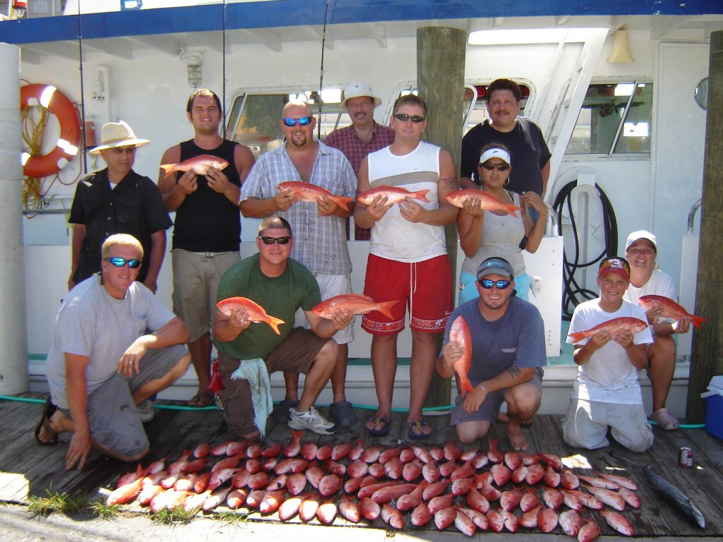 Lots of snappers lined up on the dock at the end of our drift fishing trip