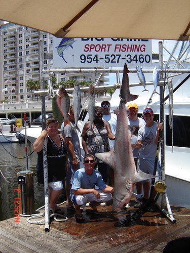 Big shark hanging up on the rack, caught by this family on our shark fishing charter