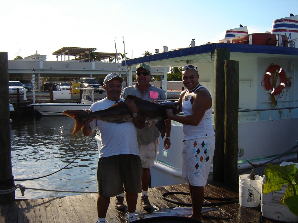 Deep sea fishing trip catches big cobia