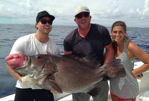Holding a big warsaw grouper, 60 pounds plus