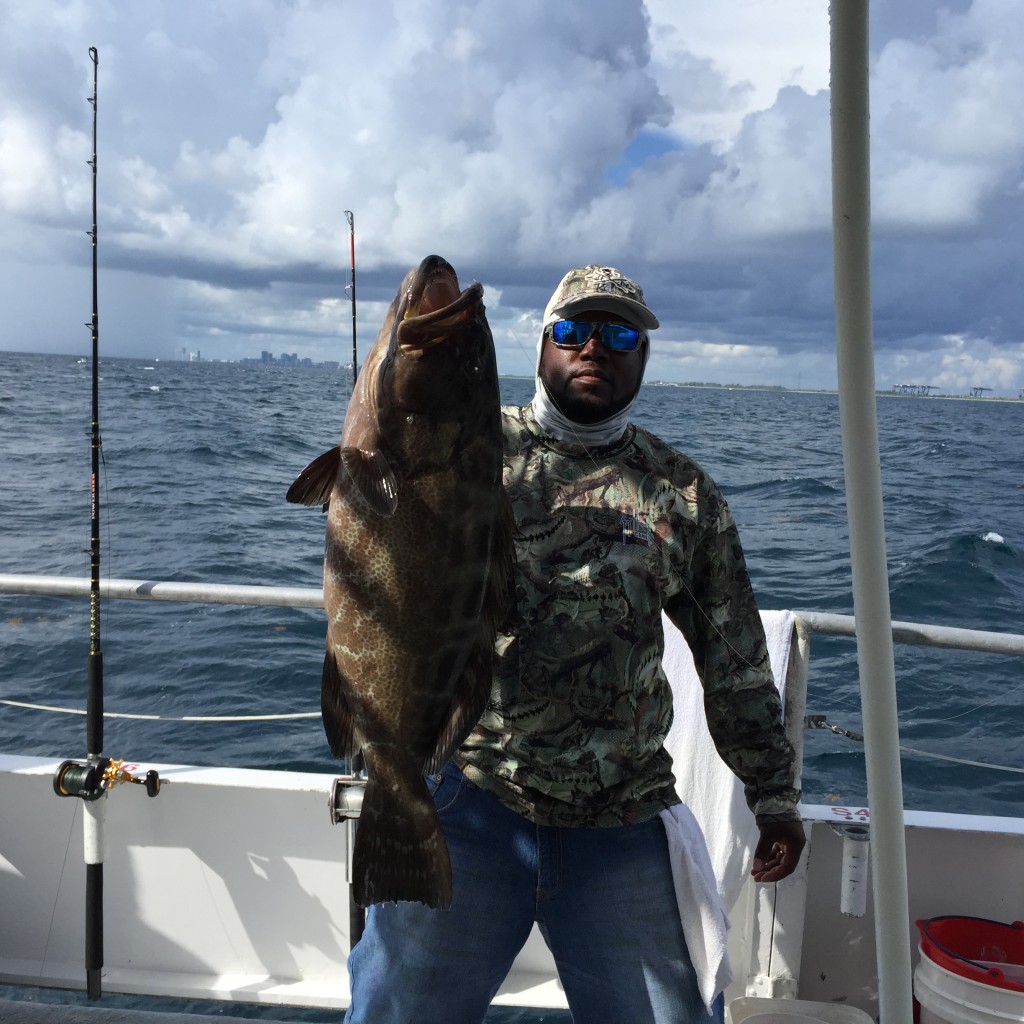 Big black grouper caught drift fishing on the reef