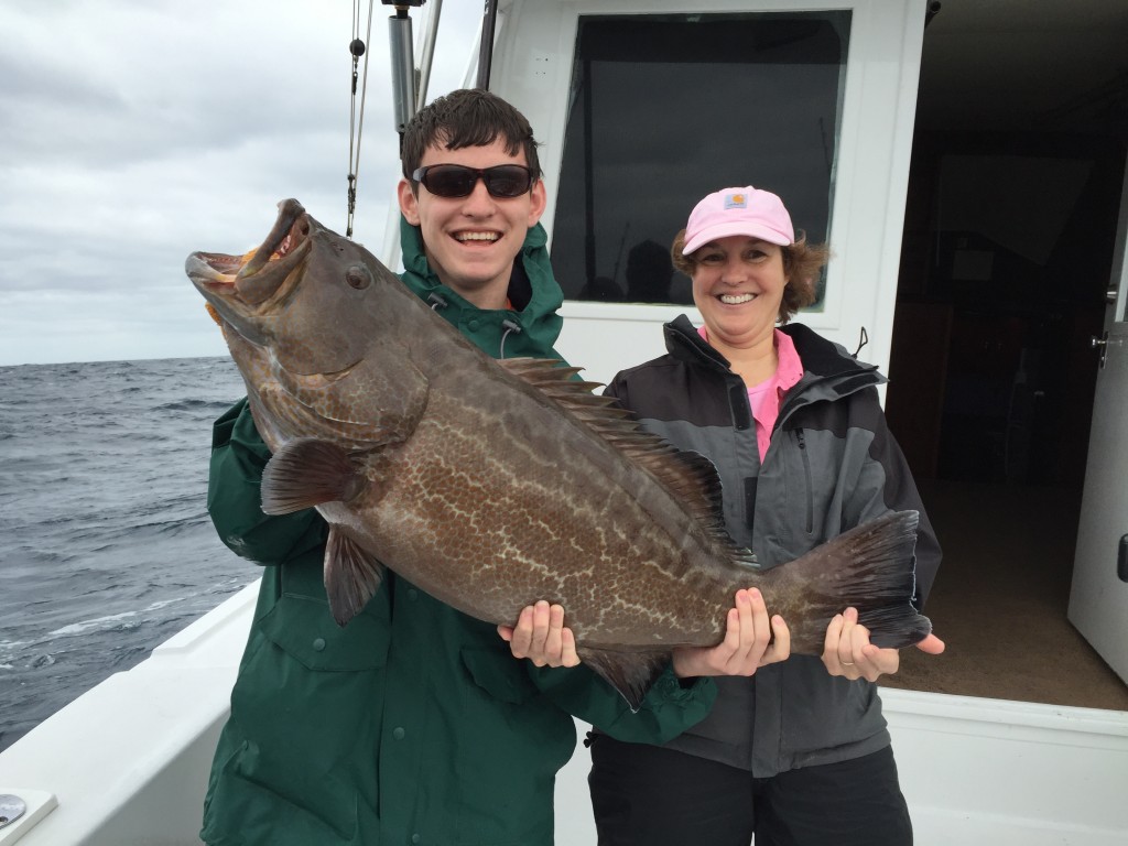 Big grouper being held on the boat