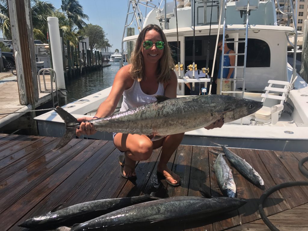 Ashlee with some big kingfish holding a big one