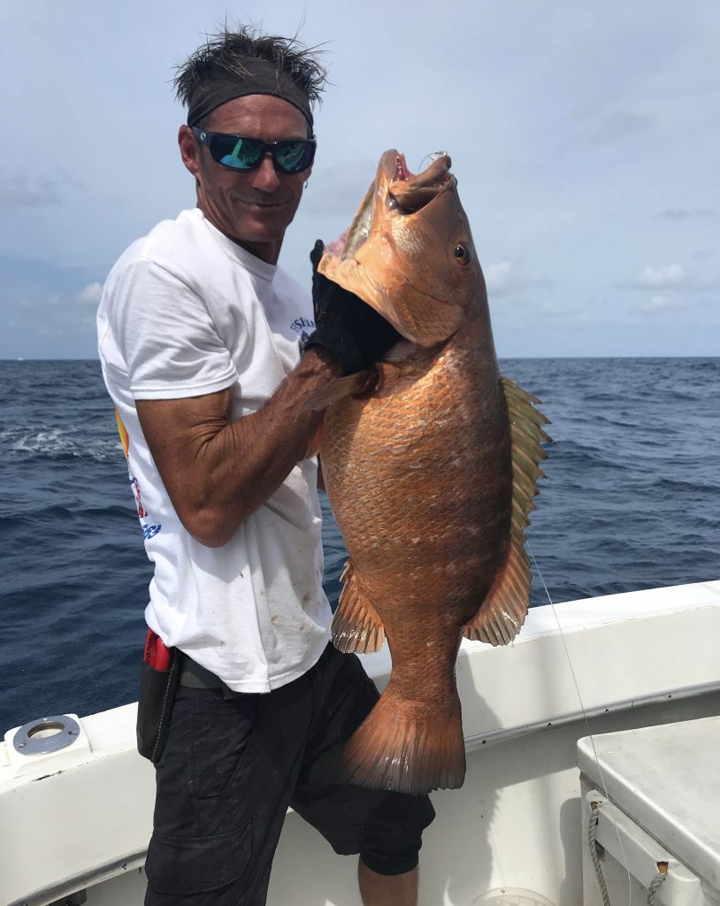 Dave holding a big cubera snapper caught on our Fort Lauderdale deep sea fishing trip.