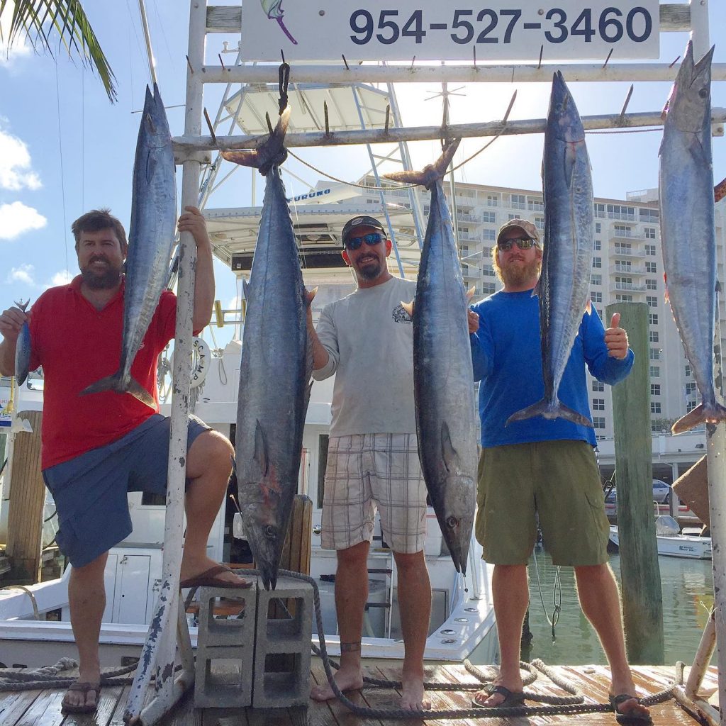 five wahoo hanging up at the dock in Fort Lauderdale